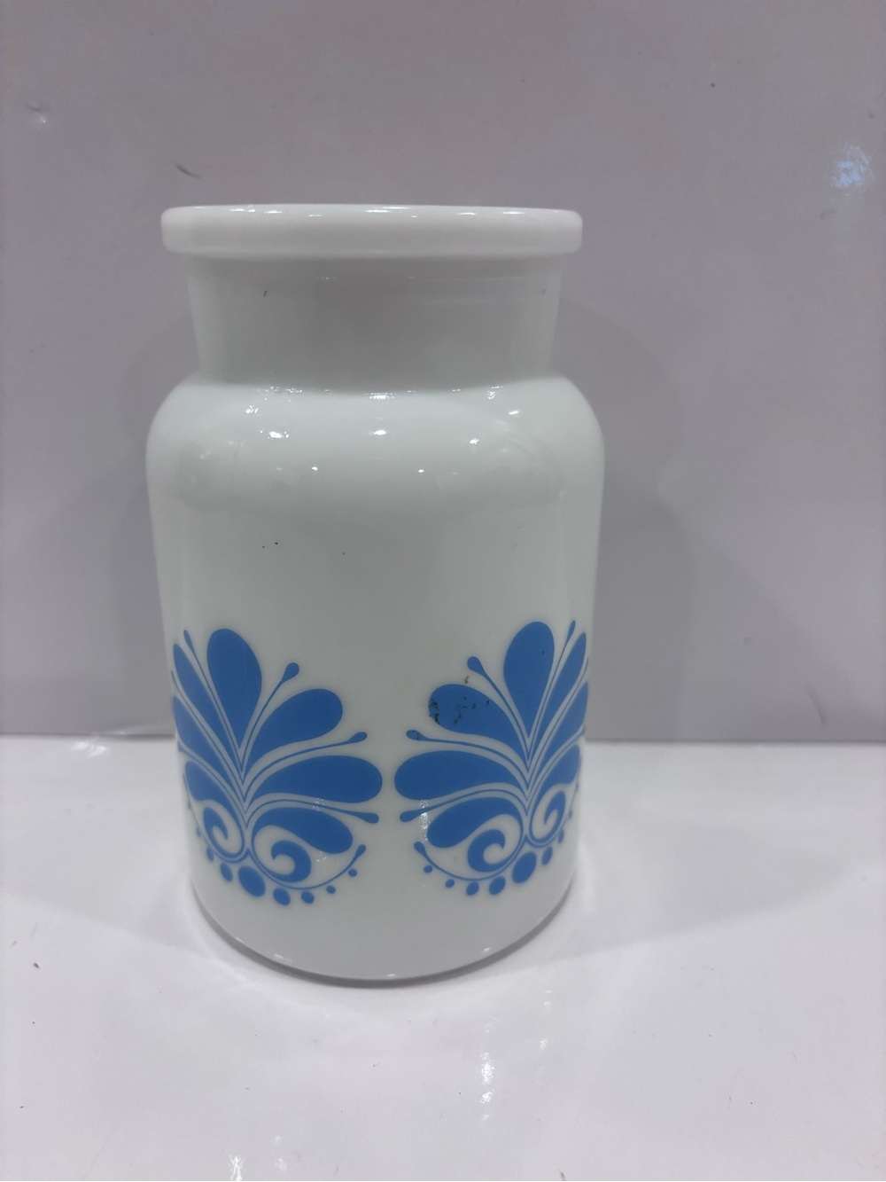 Vintage anchor hocking milk glass canister made in Belgium blue floral 5”